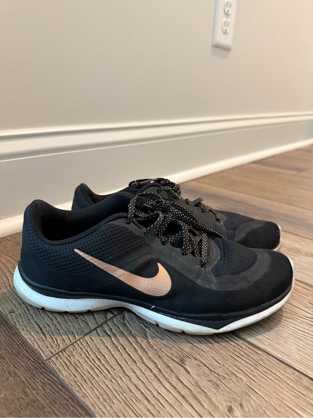 Nike Women's Black Running Shoes with Pink Swoosh